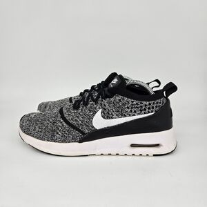 Women's Black and White Nike Sneakers